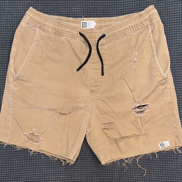 LIMITED TIME $4 ITEM!! Lira Men's Khaki Distressed Shorts with Black Drawstring - Picture 1 of 4
